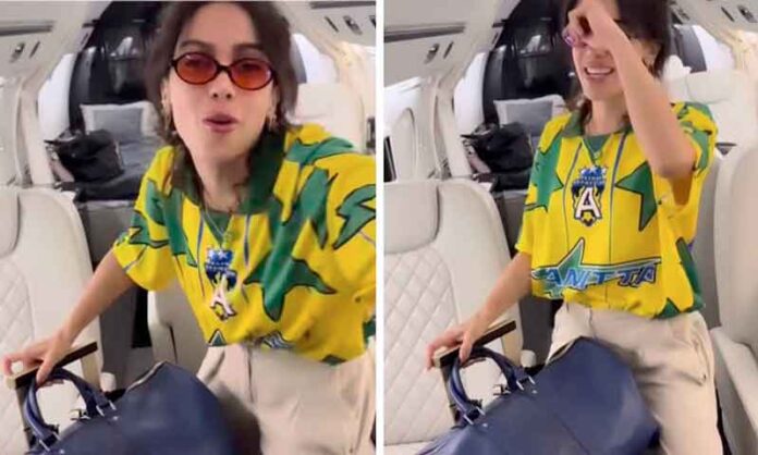Anitta-veste-camisa-da-seleção-e-embarca-para-os-EUA-onde-cantará-na-abertura-da-copa